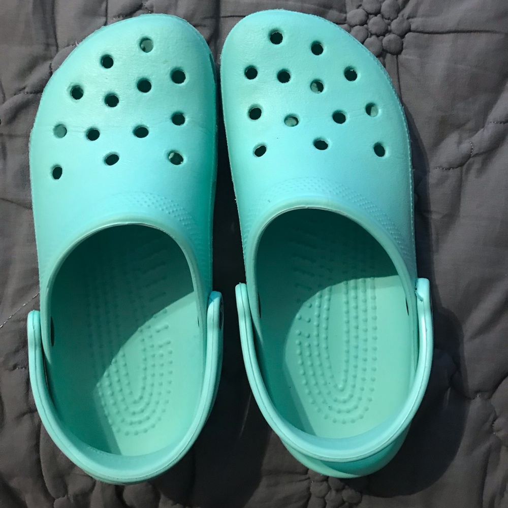 Mint green crocs